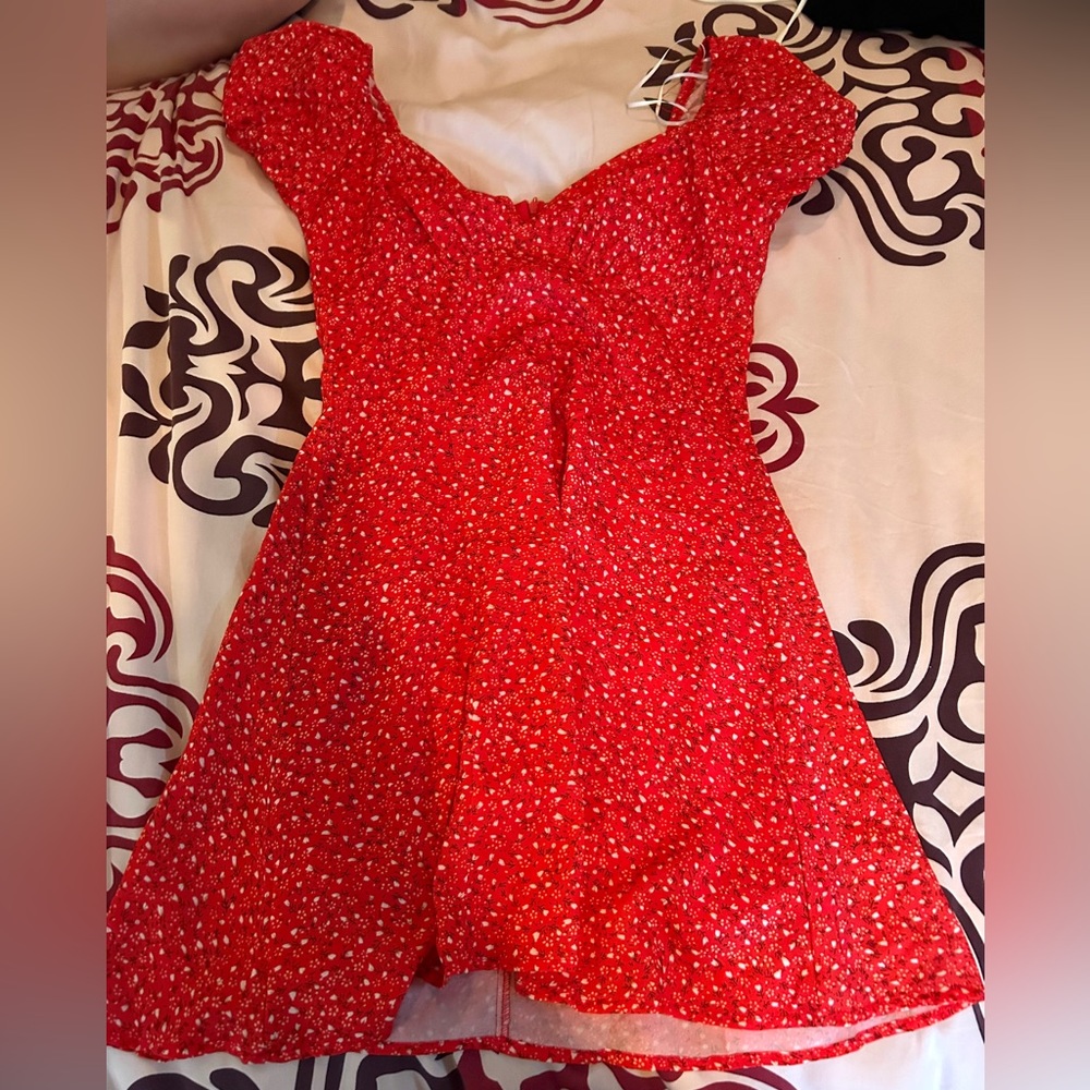 This is a cute, red mini dress.